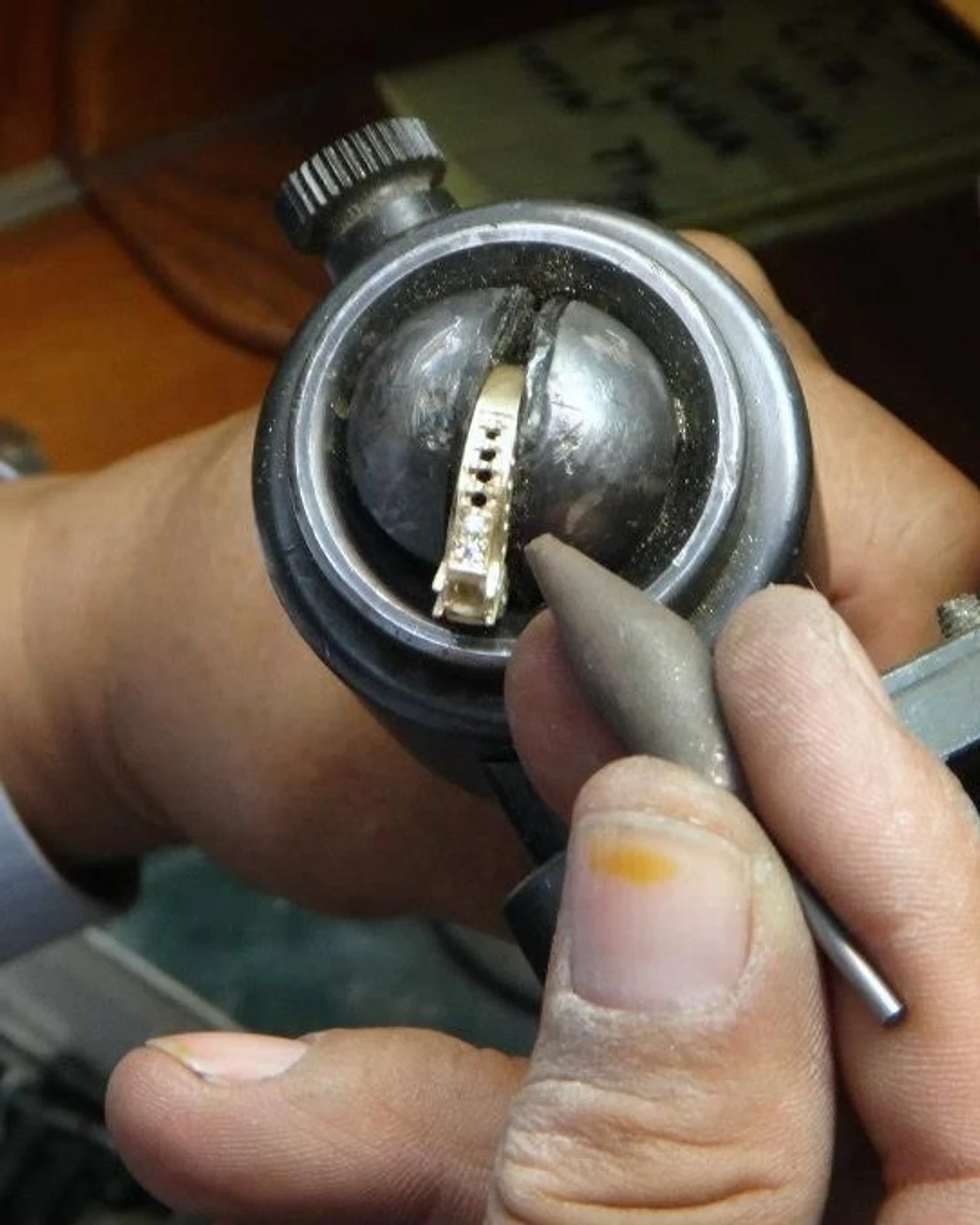 Master jeweler working on ring craftsmanship